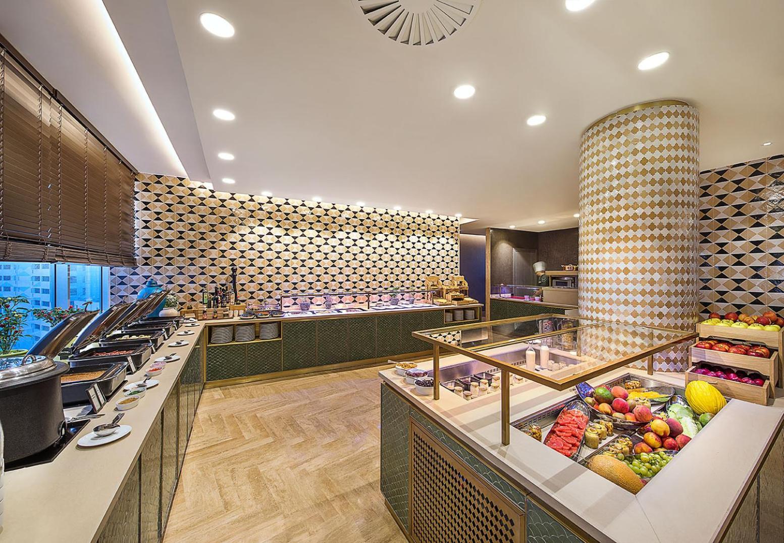 Hilton Tanger City Center Kültér fotó The buffet at the lounge