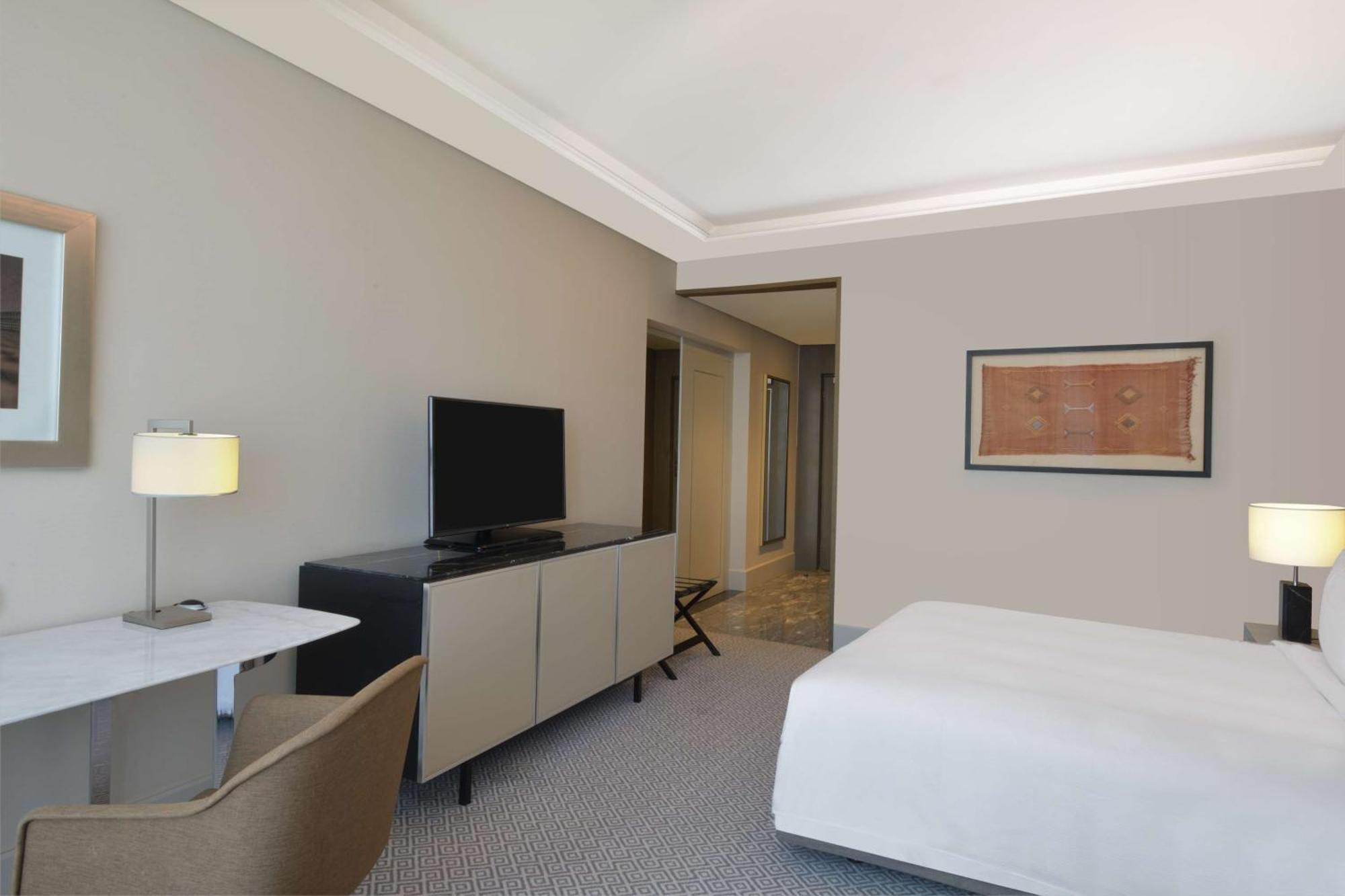 Hilton Tanger City Center Kültér fotó A guest room at the hotel